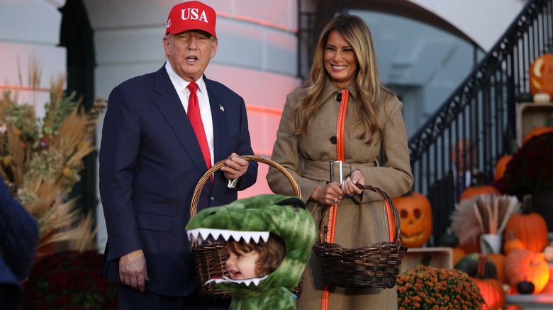 Donald and Melania Trump handing out candy on Halloween