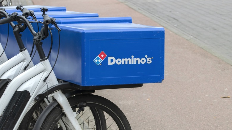 Bicycles with Domino's Pizza delivery boxes attached