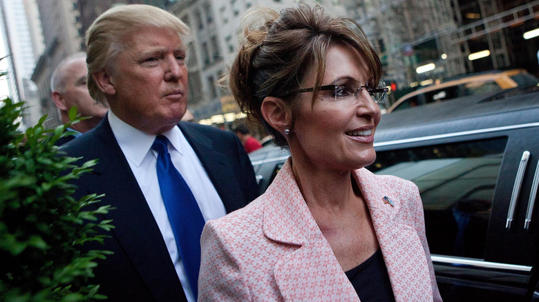 Donald Trump and Sarah Palin getting ready to enter a limo in New York City