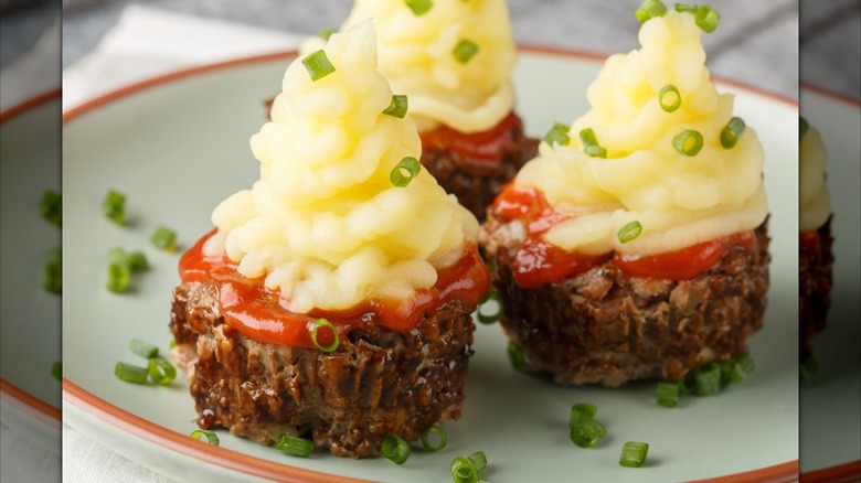 Meatloaf "muffins" topped with mashed potatoes and chives