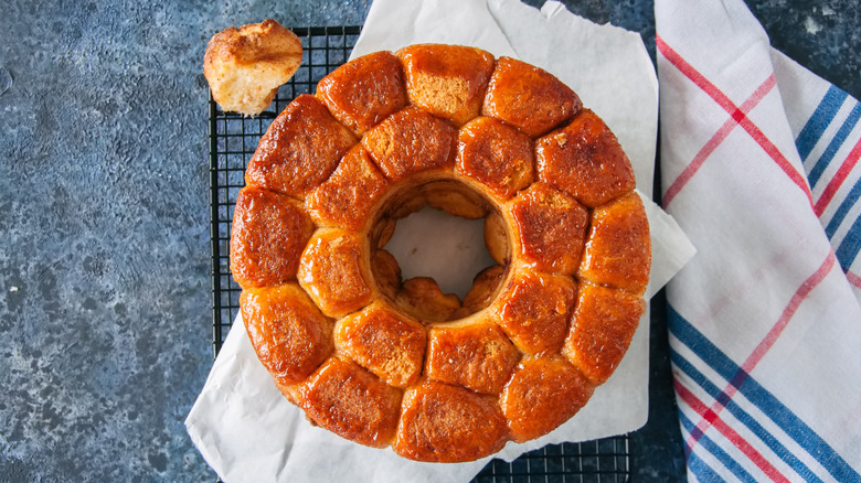 Homemade monkey bread cooling on a wire rack