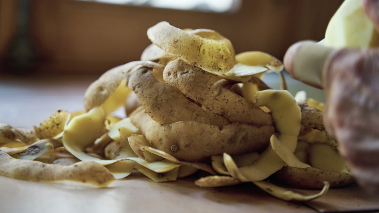 A pile of peeled potato skins