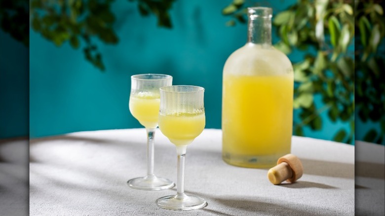 citrus liqueur in bottle and glasses