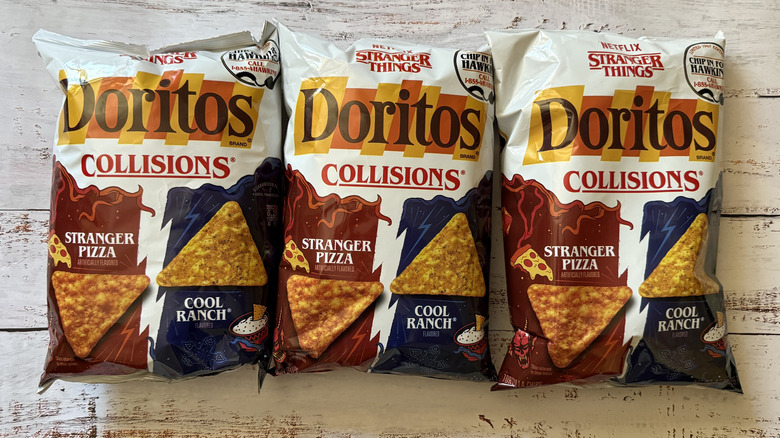 three bags of Doritos x Stranger Things Pizza Cool Ranch Collisions on white tabletop