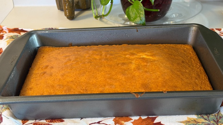 A baked Pillsbury yellow cake in a baking pan.