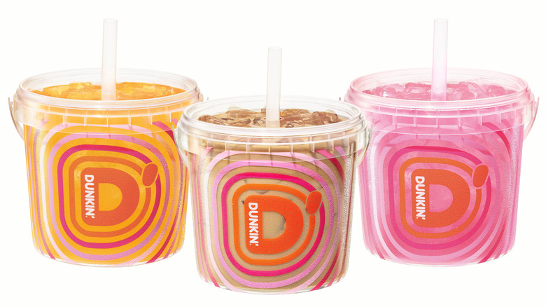 Three Dunkin' Iced Beverage Buckets on a white background.