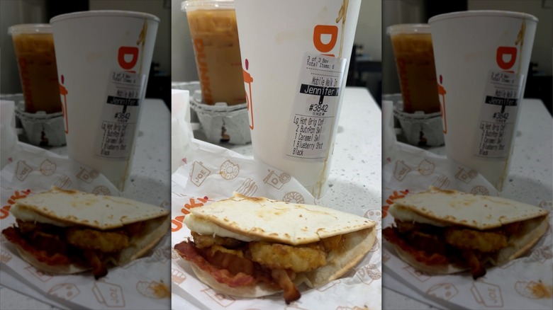 Dunkin' Wake-Up Wrap next to drink
