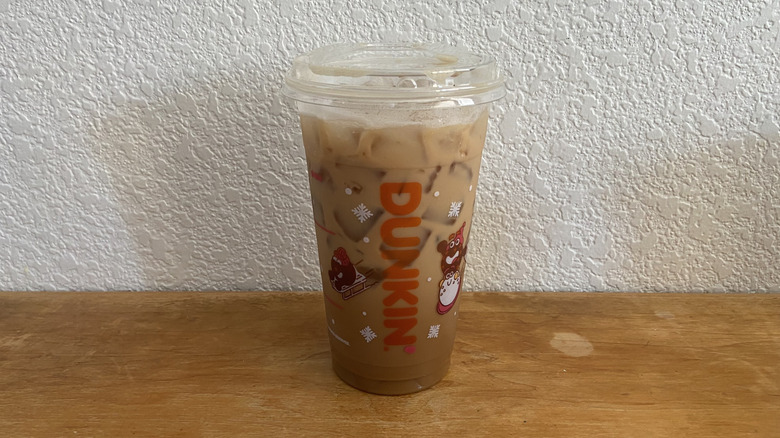 Caramel Chocolate Shakin' Espresso on wooden table.