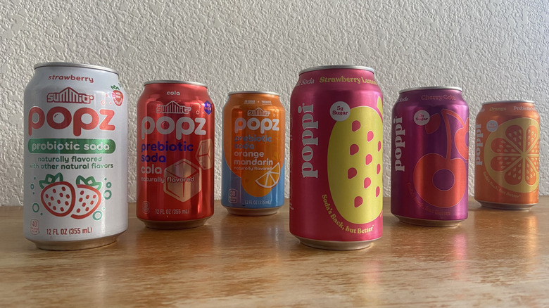 all six soda cans in adjacent diagonal arrangements