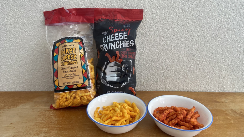Bowls of the Cheese Crunchies with their bags behind and to the left