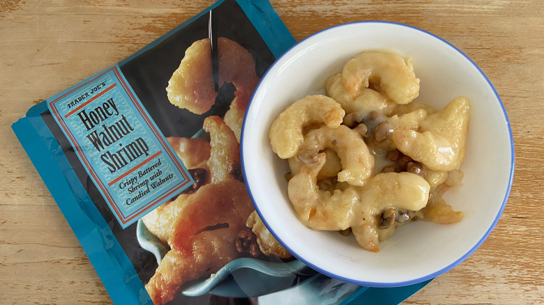 top-down view of a bowl of the Trader Joe's shrimp on top of its bag