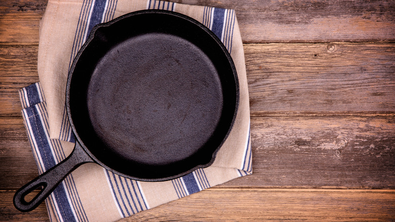 cast iron pan on a wooden table