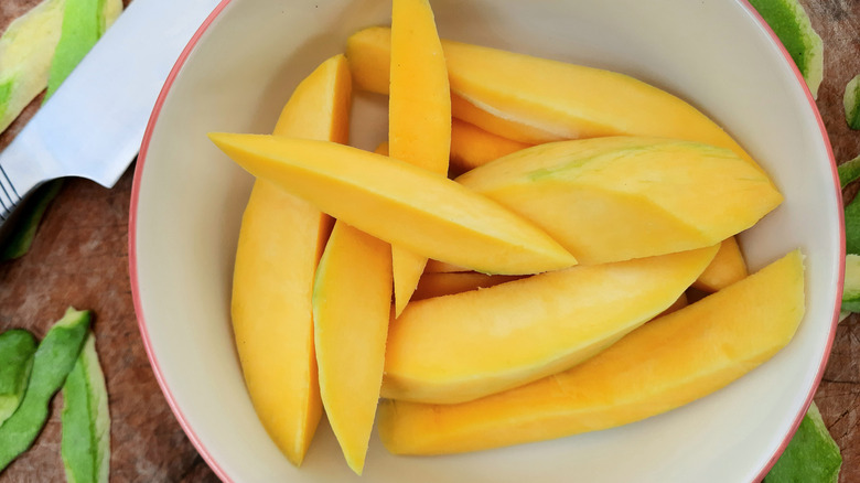 Cut and peeled mango in a bowl