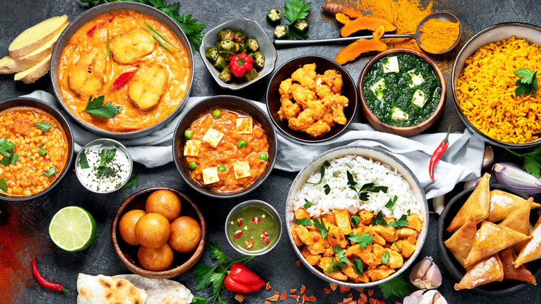 Top view of assorted Indian foods in bowls