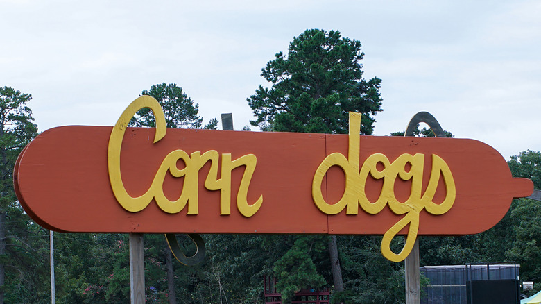 A vintage roadside sign for corn dogs