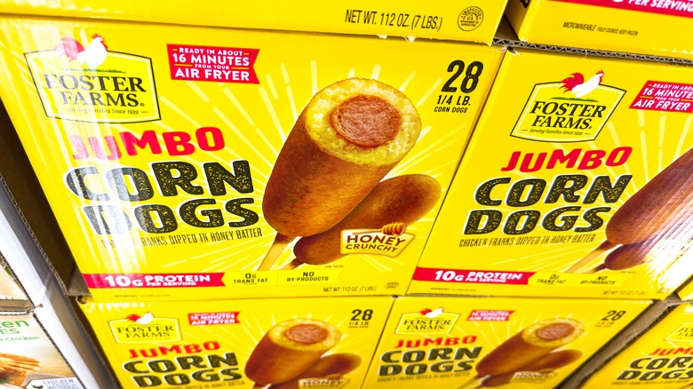 Boxes of frozen corn dogs on display at a grocery store