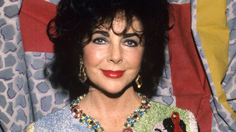 Elizabeth Taylor poses for a photograph