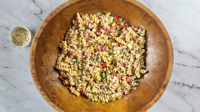Elote corn pasta salad in wooden bowl