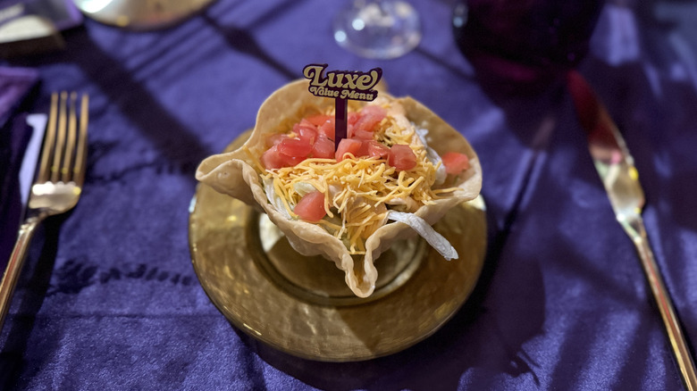 Taco Bell's Mini Taco Salad on a tiny gold plate