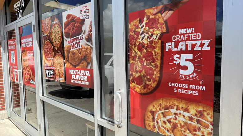 window with Pizza Hut's Crafted Flatzz sticker