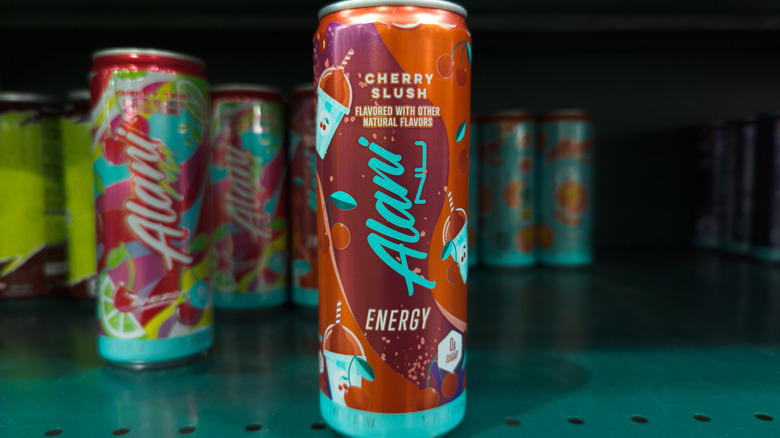 Cans of Alani Nu on store shelves