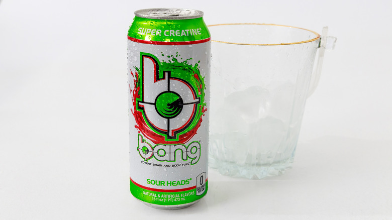 Can of Bang energy next to glass of ice