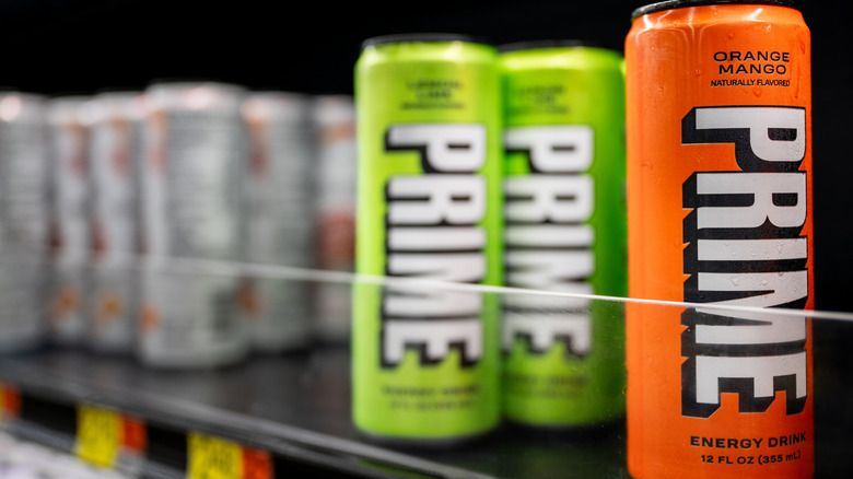 Cans of Prime energy drink in store