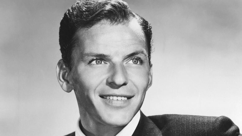 Frank Sinatra posing for photo in the 1950s