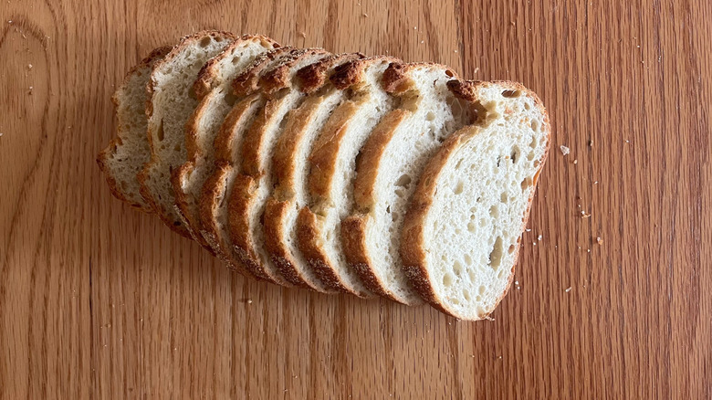 An Italian semolina loaf is cut into slices