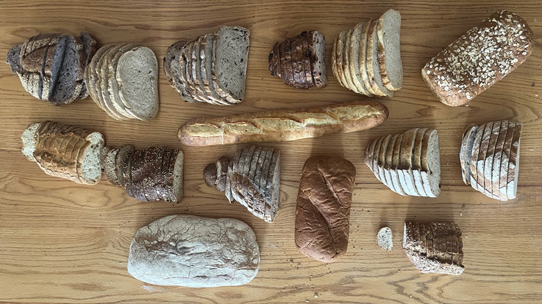 An array of breads spread on a counter