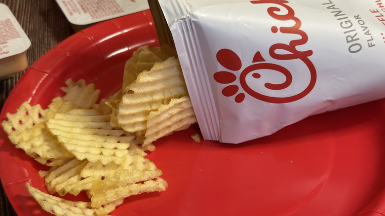 Chick-fil-A Original Flavor Waffle Potato Chips spilled out on red plate