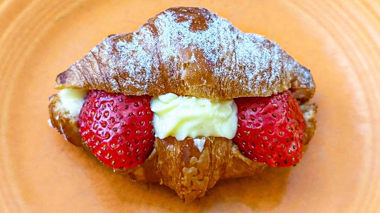 A Mini Strawberry Lemon Cream Croissant from Paris Baguette on plate