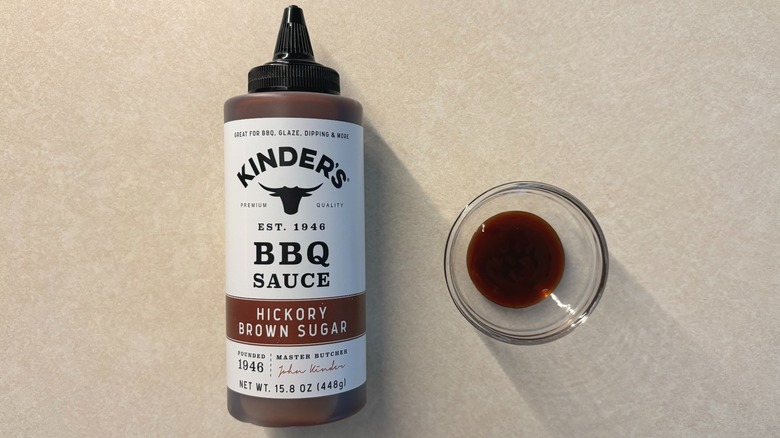 Kinder's Hickory Brown Sugar Barbecue Sauce bottle and sauce in glass ramekin