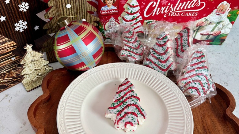 Little Debbie original Christmas Tree Cakes arranged on a tray and white plate