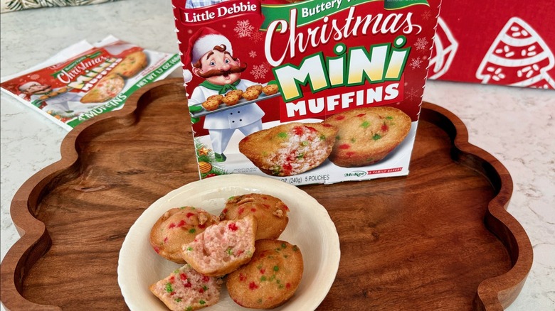 A tray with a box and open package of Little Debbie Christmas Mini Muffins