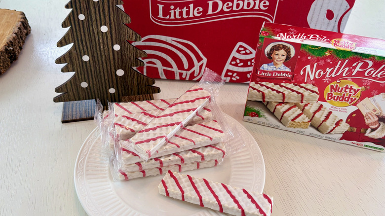 A stack of Little Debbie North Pole Nutty Buddy bars on a plate