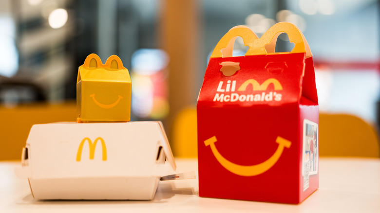 A McDonald's Happy Meal in red packaging