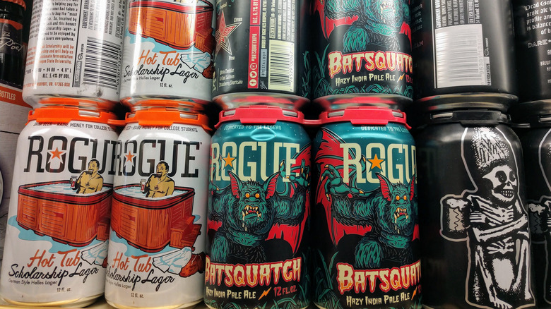 A line of Rogue brand beers in cans