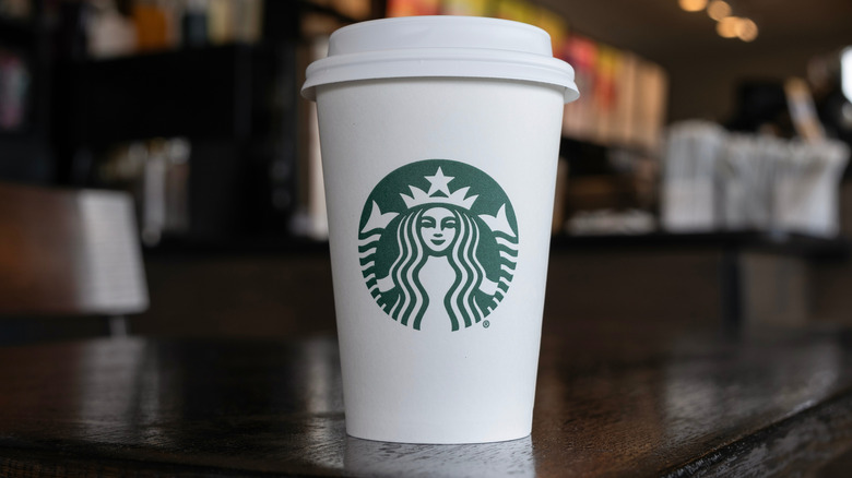Starbucks coffee cup on the bar