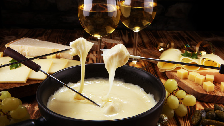 A close-up of a cheese fondue dinner