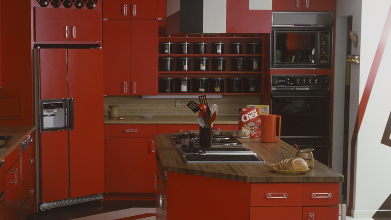 A red 1970s kitchen