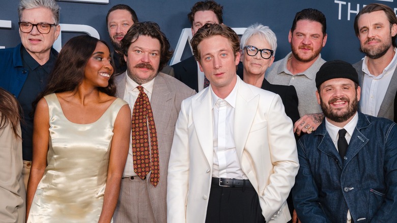 The cast of "The Bear" posing for photographs
