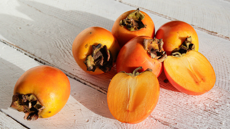 Persimmons on a table
