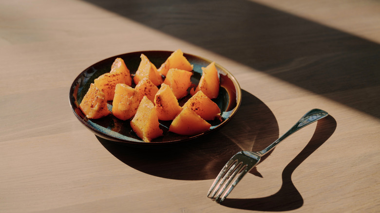 Baked persimmon pieces on a plate