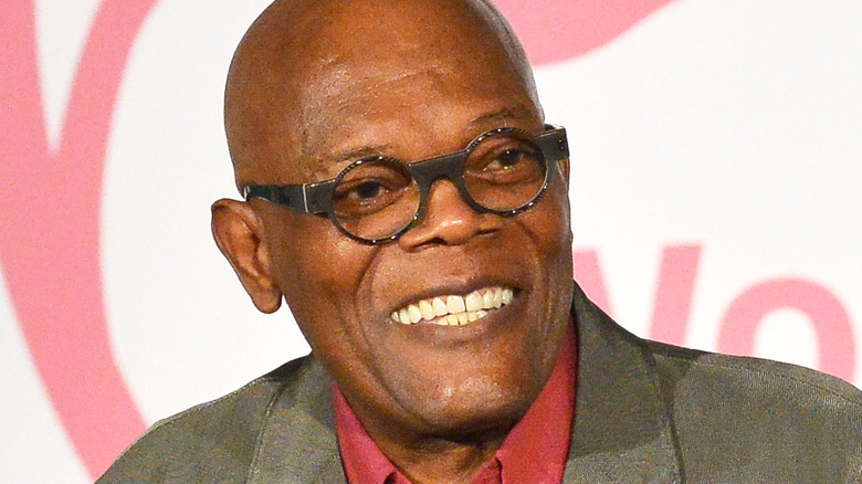 Samuel L. Jackson smiling while speaking at a public event.