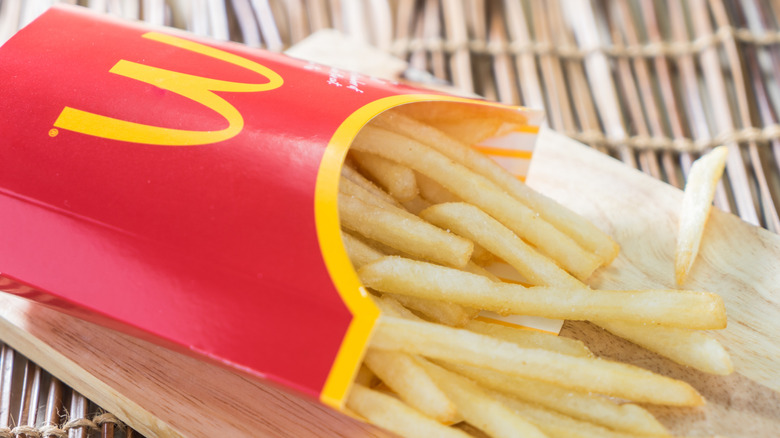 A box of McDonald's fries on a tray.