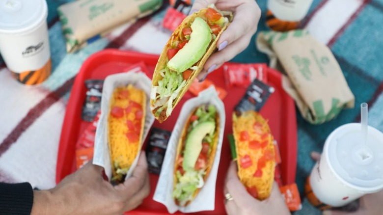 Del Taco tacos with cheese and vegetables