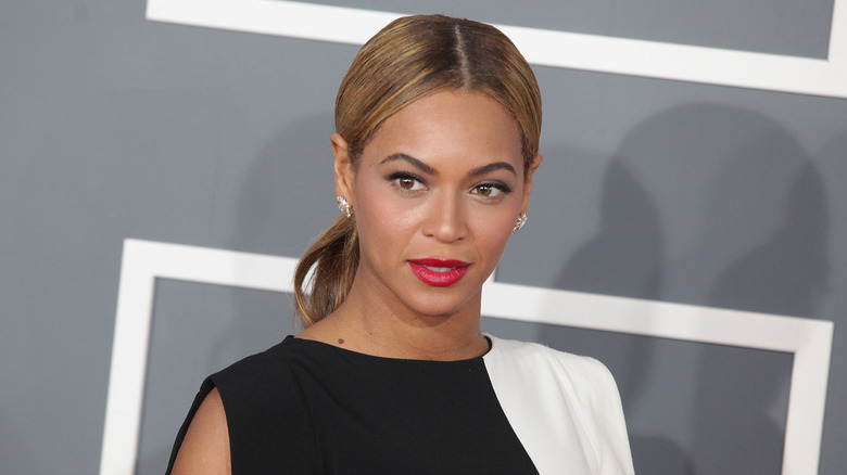 Beyoncé smiling at the premiere of a movie
