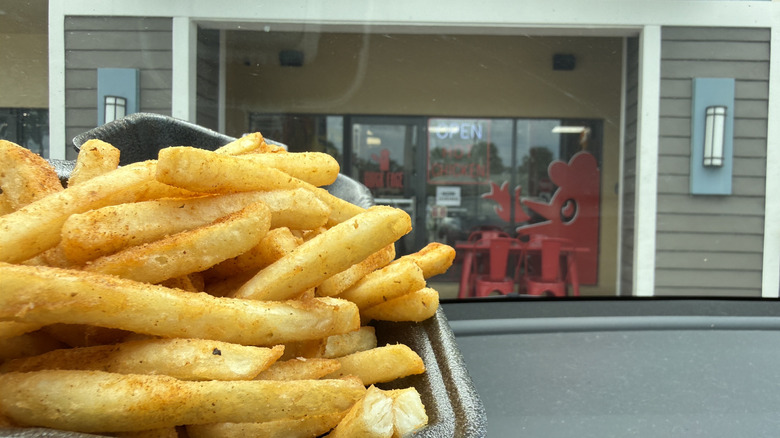Cluck Face fries out of car window