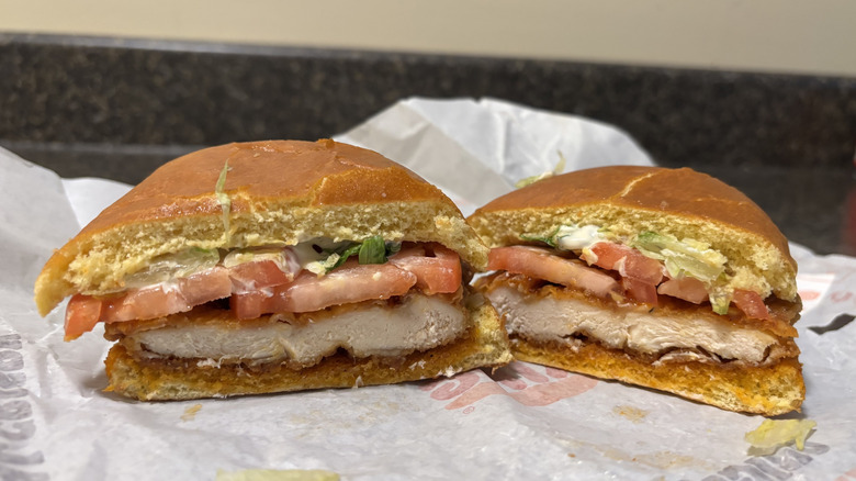 Burger King Spicy Royal Crispy Chicken cut in half on wrapper